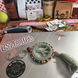 The Sak Green Peace Sign Keychain with Multicolor Beads